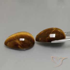 Gemas de Ojo de Tigre Marrón cálido natural de 22.82 ct, En forma de pera, Opaco