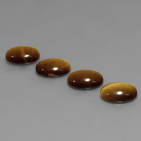 Gemas de tiger's eye marrón natural de  ct, corte óvalo, opaco
