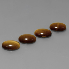 Gemas de tiger's eye marrón natural de  ct, corte óvalo, opaco