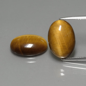 Gemas de tiger's eye marrón natural de  ct, corte óvalo, opaco