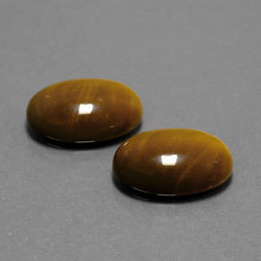 Gemas de tiger's eye marrón natural de  ct, corte óvalo, opaco