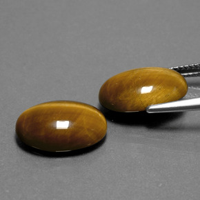 Gemas de tiger's eye marrón natural de  ct, corte óvalo, opaco