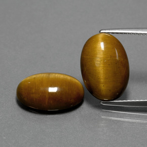 Gemas de tiger's eye marrón natural de  ct, corte óvalo, opaco
