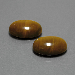 Gemas de tiger's eye marrón natural de  ct, corte óvalo, opaco