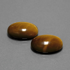 Gemas de tiger's eye marrón natural de  ct, corte óvalo, opaco