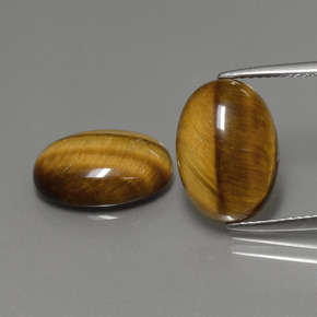 Gemas de tiger's eye marrón natural de  ct, corte óvalo, opaco