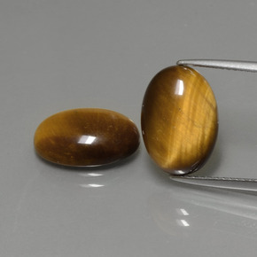 Gemas de tiger's eye marrón natural de  ct, corte óvalo, opaco
