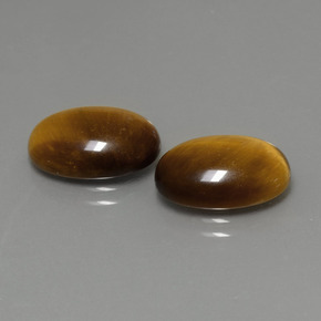 Gemas de tiger's eye marrón natural de  ct, corte óvalo, opaco