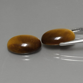 Gemas de tiger's eye marrón natural de  ct, corte óvalo, opaco