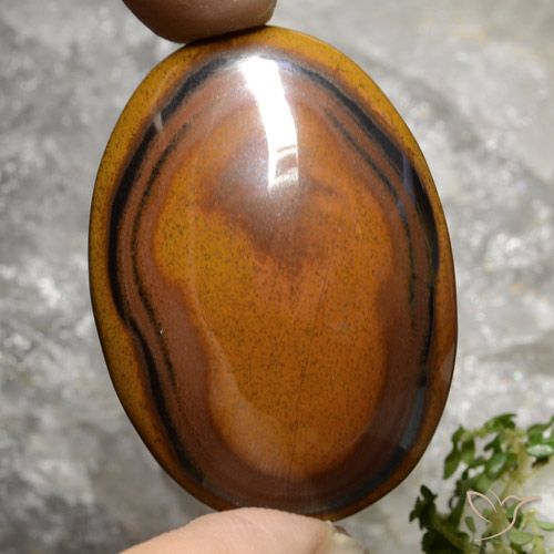 Tiger's eye marrón natural de 92,65 ct, corte óvalo, opaco