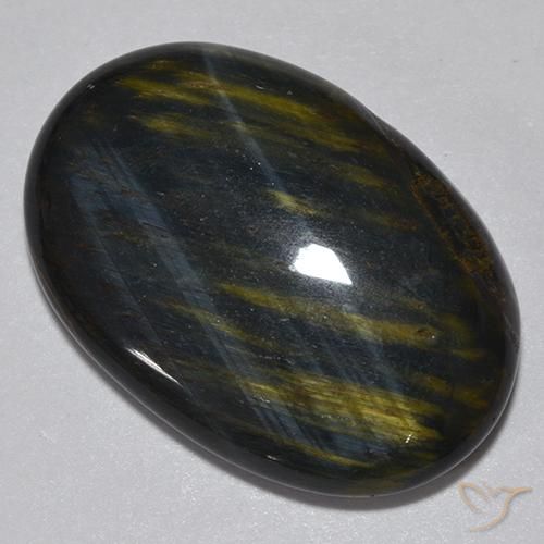 Ojo de Tigre Marrón oro natural de 16.76 ct, Ovalada, Opaco