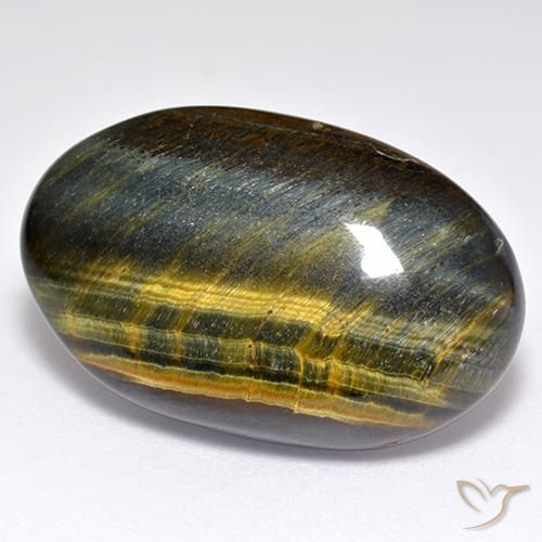 Ojo de Tigre Marrón oro natural de 28.26 ct, Ovalada, Opaco