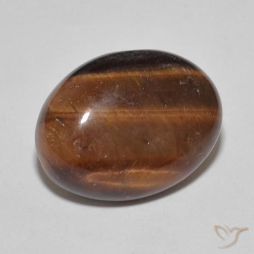 Ojo de Tigre Marrón naranja natural de 8.54 ct, Ovalada, Opaco