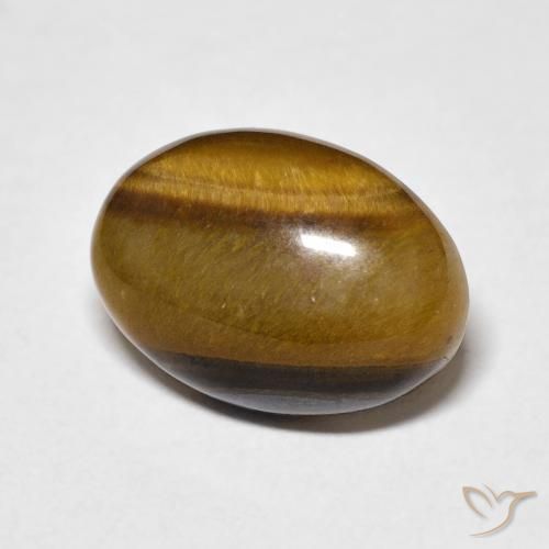 Ojo de Tigre Marrón amarillento natural de 5.64 ct, Ovalada, Opaco