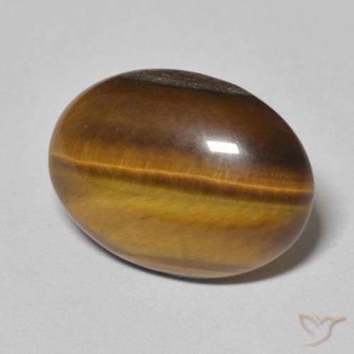 Ojo de Tigre Marrón amarillento natural de 8.67 ct, Ovalada, Opaco
