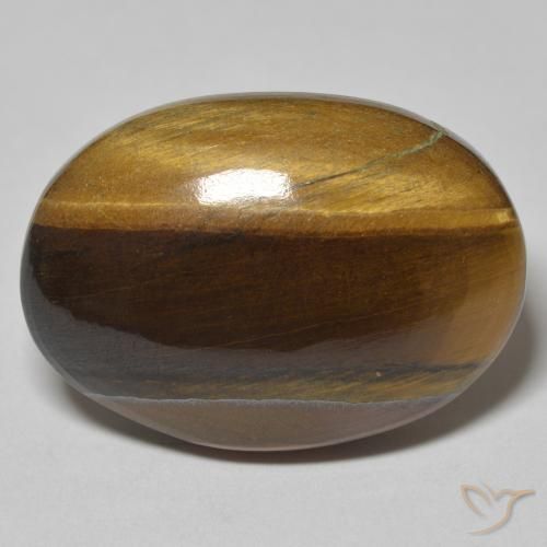 30.36ct Natural Marrón amarillento Ojo de Tigre, Ovalada, Opaco