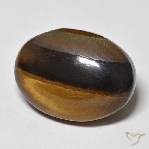 Ojo de Tigre Marrón amarillento natural de 26.28 ct, Ovalada, Opaco