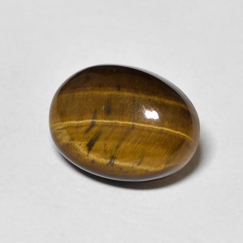 Ojo de Tigre Marrón dorado natural de 5.06 ct, Ovalada, Opaco