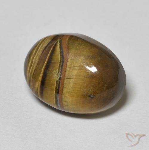 Ojo de Tigre Marrón amarillento natural de 6.95 ct, Ovalada, Opaco