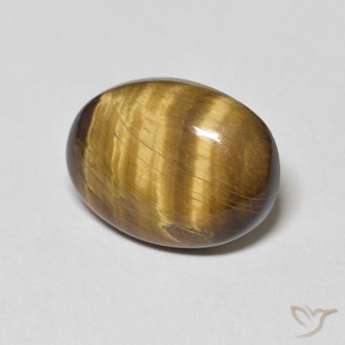 Ojo de Tigre Marrón amarillento natural de 8.10 ct, Ovalada, Opaco