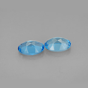 Gemas de topacio azul natural de  ct, corte óvalo, VVS-VS