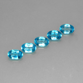 Gemas de topacio azul natural de  ct, corte óvalo, VS