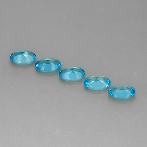 Gemas de topacio azul natural de  ct, corte óvalo, VS