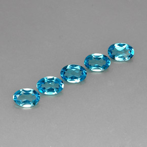Gemas de topacio azul natural de  ct, corte óvalo, VS
