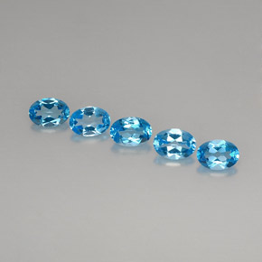 Gemas de topacio azul natural de  ct, corte óvalo, VVS