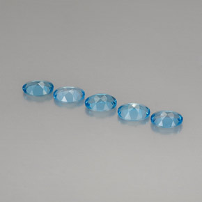 Gemas de topacio azul natural de  ct, corte óvalo, VVS