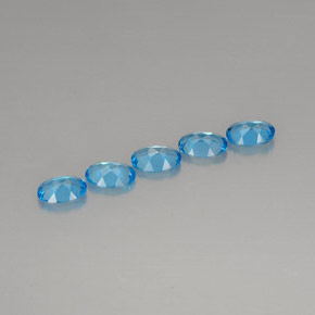 Gemas de topacio azul natural de  ct, corte óvalo, VVS