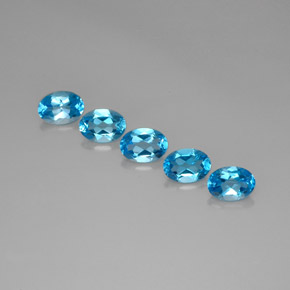Gemas de topacio azul natural de  ct, corte óvalo, VVS-VS