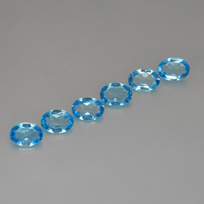 Gemas de topacio azul natural de  ct, corte óvalo, VVS-VS