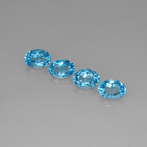 Gemas de topacio azul natural de  ct, corte óvalo, VVS-VS