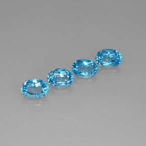 Gemas de topacio azul natural de  ct, corte óvalo, VVS-VS