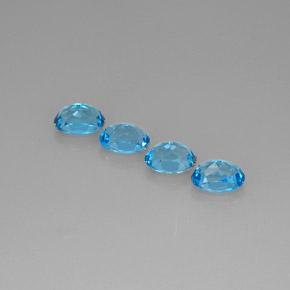 Gemas de topacio azul natural de  ct, corte óvalo, VVS-VS