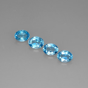 Gemas de topacio azul natural de  ct, corte óvalo, VVS-VS