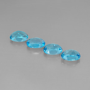 Gemas de topacio azul natural de  ct, corte óvalo, VVS-VS