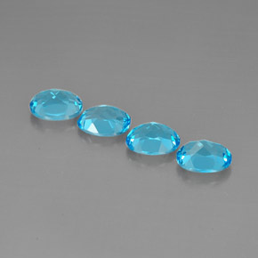 Gemas de topacio azul natural de  ct, corte óvalo, VVS-VS
