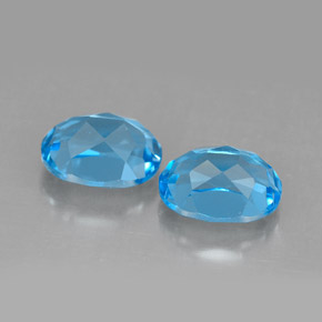 Gemas de topacio azul natural de  ct, corte óvalo, VVS-VS