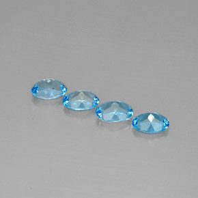 Gemas de topacio azul natural de  ct, corte óvalo, VVS-VS