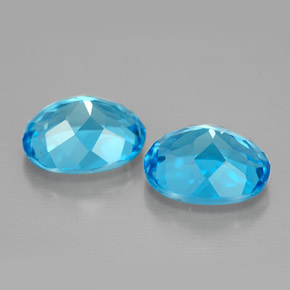 Gemas de topacio azul natural de  ct, corte óvalo, VVS