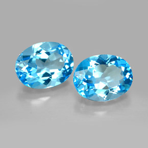Gemas de topacio azul natural de  ct, corte óvalo, VVS