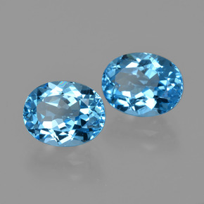 Gemas de topacio azul natural de  ct, corte óvalo, VS