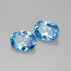 Gemas de topacio azul natural de  ct, corte óvalo, VVS