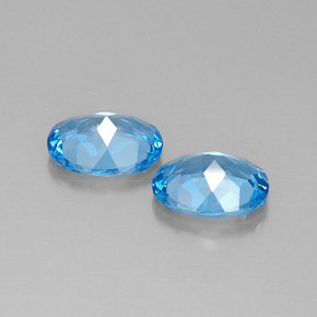 Gemas de topacio azul natural de  ct, corte óvalo, VVS