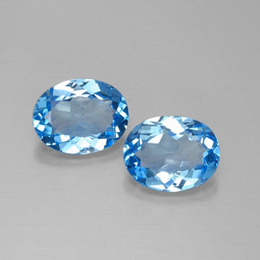 Gemas de topacio azul natural de  ct, corte óvalo, VVS