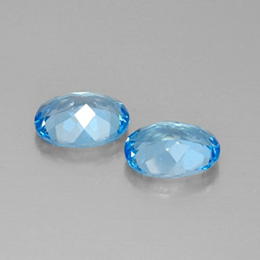 Gemas de topacio azul natural de  ct, corte óvalo, VVS