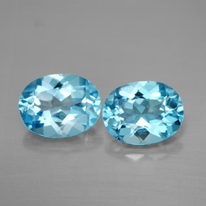 Gemas de topacio azul natural de  ct, corte óvalo, VVS