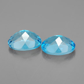 Gemas de topacio azul natural de  ct, corte óvalo, VVS